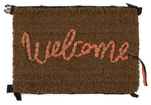 
	
		Banksy,
		British b.1974-
		 
		Welcome Mat, 2020;
		 
		hand-stitched mat in fabric...