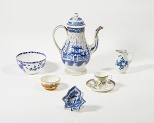 A group of English ceramics, comprising: a Caughley sparrow beak cream jug, c.1770-80, with...