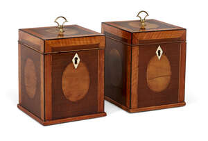 
	
		A pair of George III mahogany cube-shape tea caddies, with satinwood crossbanding and...