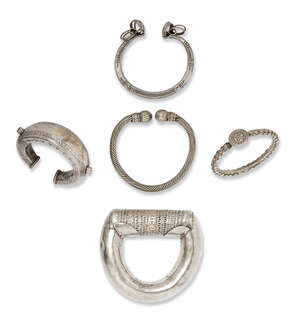 
	
		A group of silver bangles, mainly Yemen, early 20th century, comprising one of large form...