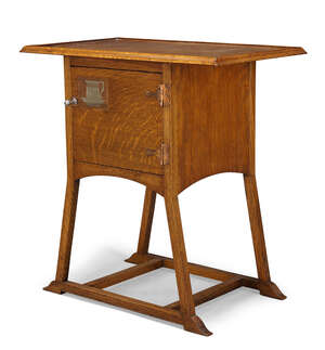 
	
		An Arts & Crafts oak and inlaid free-standing 'Tea-room' table  
		c.1900 
		Having a...
