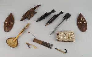 
	
		A miscellaneous collection of mostly modern tribal items, to comprise a shell covered...