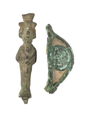 
	
		An Egyptian bronze figure, and an eye, figure 8.4cm. high (2)
		 
		Provenance: Private...
