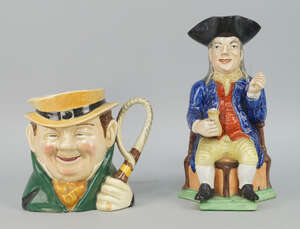 
	
		A Toby jug, early 19th century, The Hearty Fellow, modelled in typical form as a seated...