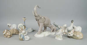 
	
		A Lladro figure of an elephant and its calf, 20th century, 31cm high, together with a...