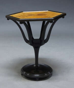 
	
		A Continenal hexagonal and ebonised occasional table, early 20th Century and later, the...