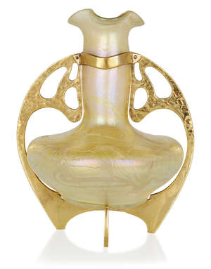 
	
		Otto Thamm (1860-c.1905) for Fritz Heckert, 
		 
		'Changeant' vase in mount, circa...