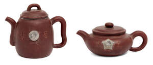 
	
		Two Chinese yixing Mao Tse Tung teapots, late 20th century, each applied with a plaque...
