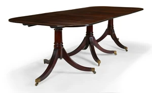 An English mahogany triple pedestal dining table, of George III style, second quarter 20th...