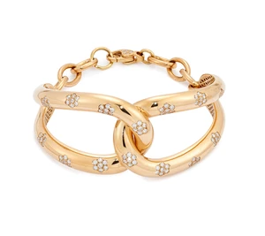 A diamond set bracelet, the upper-half designed as an openwork knot panel with flush-set...