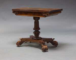 
	
		A William IV mahogany tea table, the rectangular fold over top, enclosing storage...