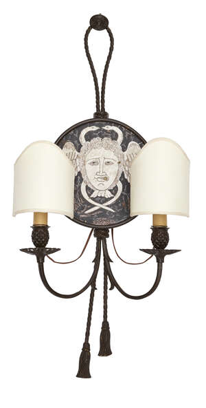 
	
		A painted brass twin branch wall light, 20th Century, the circular inlaid design set with...
