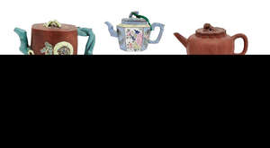 
	
		Six Chinese yixing teapots, 20th century, including two enamelled hexagonal teapots, a...