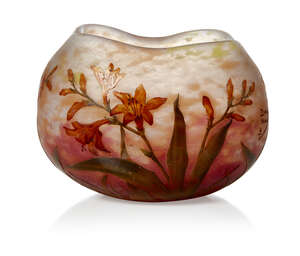 
	
		Daum (French), an enamelled and cased glass vase with quatrefoil neck 
		c.1910,...