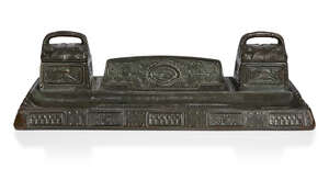 
	
		Gustav Gurschner (1873-1971), a Jugendstil patinated bronze double inkwell and pen...