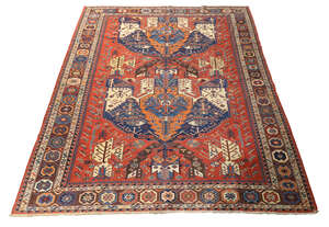 
	
		An Afghani Kazak flat weave carpet, second quarter 20th century, the central field with...