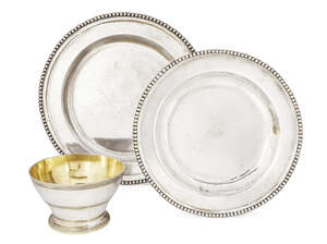 
	
		Two Ottoman silver plates, each with beaded border, 38.5cm and 33cm diameter...