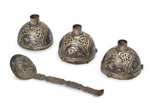 
	
		A group of nielloed silver domed fittings, Iran, 12th century and a silver spoon, 5.5cm....