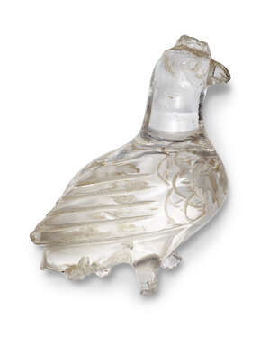 A Parthian carved rock crystal figure of a bird, Iran, circa 2nd-3rd century, with delineated wings folded behind, with crest to head and curved beak, 5cm. hig