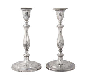 A pair of silver candlesticks, London c.1942, NB & SN, with baluster stems, 27cm high (loaded base) (2)