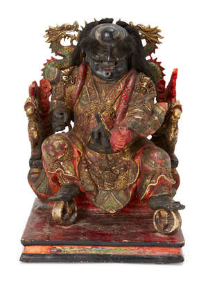 
	
		Japanese carved wood Komokuten figure, the guardian deity, seated on dragon throne, wears...