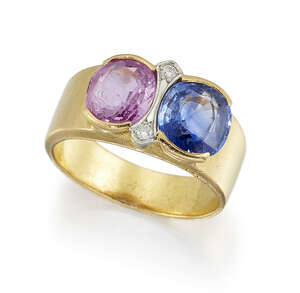 
	
		A sapphire and pink sapphire ring, with diamond points, the two half-collet set...