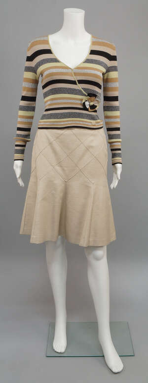 
	
		Chanel: a striped top, cotton/viscose, with black, coffee, caramel, cream and silver...