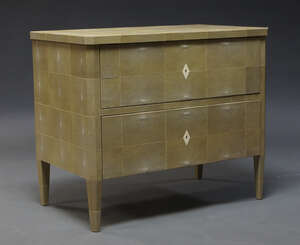 
	
		A modern shagreen chest of drawers, of recent manufacture, the rectangular top above two...