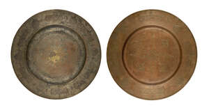 
	
		Two engraved copper bowls, Deccan, 17th century, the first of tinned copper engraved to...