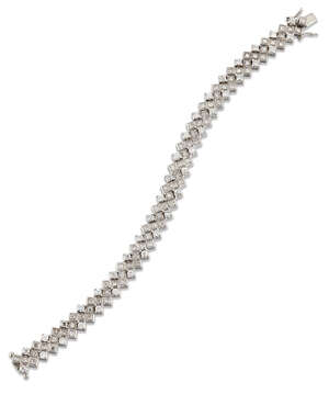 
	
		A diamond flexible bracelet, composed  of diamond articulated zig zag design panels,...