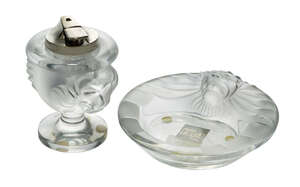 
	
		Lalique, a clear and frosted glass lighter with Ronson mechanism and a matching...