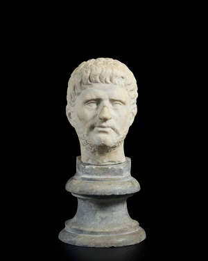 A Roman marble portrait head of a man,Neronian circa 1st AD
Recut, with curly hair and beard,...