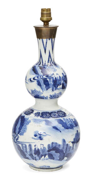 
	
		A Japanese Arita porcelain double gourd vase, 17th century, painted in underglaze blue...