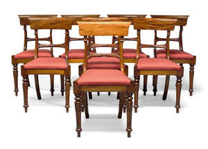 A set of eight Regency style mahogany bar back dining chairs, late 20th Century, with shaped bar...