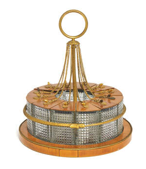 
	
		A Charles X gilt-bronze mounted cut-glass spice holder, c.1830, the ring handle hung with...