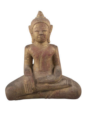 
	
		A large Burmese carved gilt stone buddha, 19th century, seated in dhyanasana, 44cm high ...