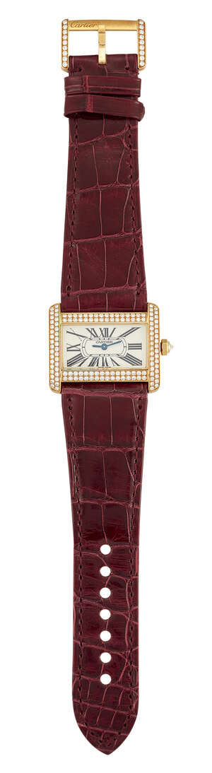 
	
		An 18ct gold and diamond quartz 'Divan' wristwatch by Cartier, the rectangular dial with...