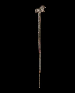 A silver pin with recumbent bull pinhead, possibly Achaemenid, circa 5th -4th Century B.C.,...