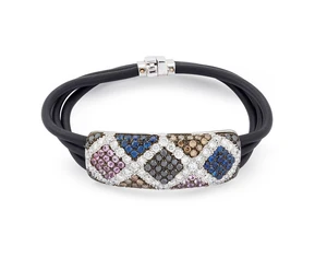 A diamond and gem-set bracelet, the central panel set with diamonds, brown and black diamonds,...