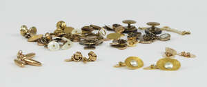 
	
		A pair of 18ct gold cufflinks, of large textured concave oval form, set with a half...