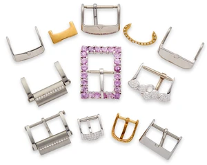 A group of signed and other watch buckles and partsIncluding: a small Audemars Piguet buckle...