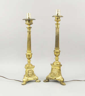
	
		A pair of Continental brass pricket sticks, late 19th century, converted to electricity,...