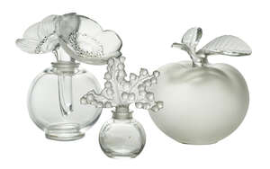 
	
		René Lalique (1860-1945), a clear and frosted glass scent bottle 
		Clairefontaine,...