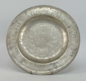 
	
		A Continental pewter changer, probably Vienna, 18th century, the shallow welled base...