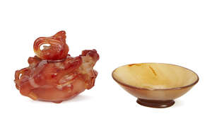 
	
		A Chinese carnelian agate water pot and cover, late 19th century, carved with three...