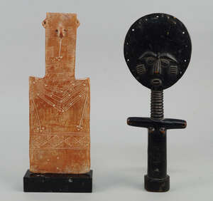 
	
		An Ashanti female fertility doll, 30cm high, together with a terracotta plaque depicting...