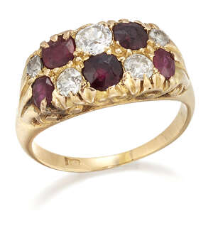 
	
		A ruby and diamond ring, of half-hoop design, set alternately with old brilliant-cut...