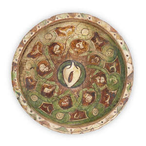 
	
		A large Nishapur pottery bowl, Iran, 12th century, of deep conical form with everted rim,...