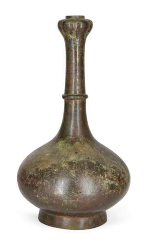 
	
		A Chinese bronze garlic-head vase, Han Dynasty, of compressed globular form with long...