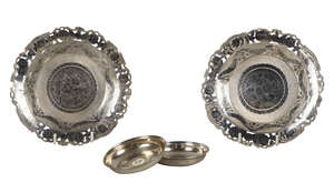
	
		A pair of niello  dishes, with floral pierced borders, unmarked, 17.5cm diameter,...